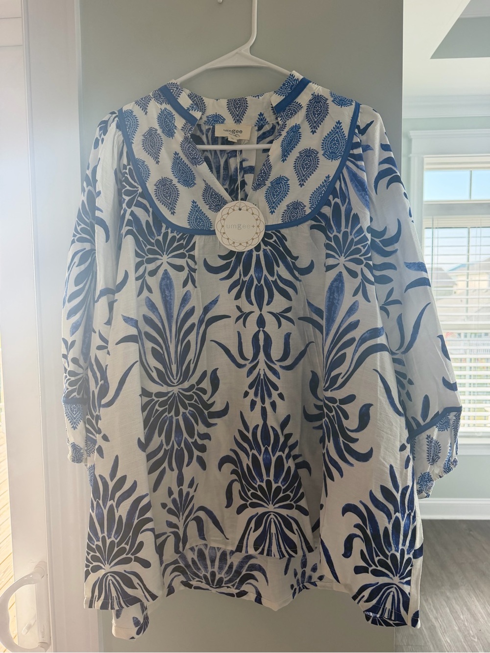 Umgee White Blouse with Blue Floral Print - women’s plus